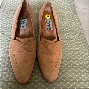 Loafers made with Italian croc leather